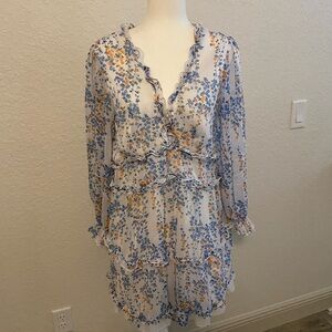 Long sleeve flowy floral open back dress